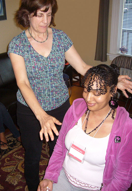 Madeline Hartman doing a demonstration during Psychic Tools class