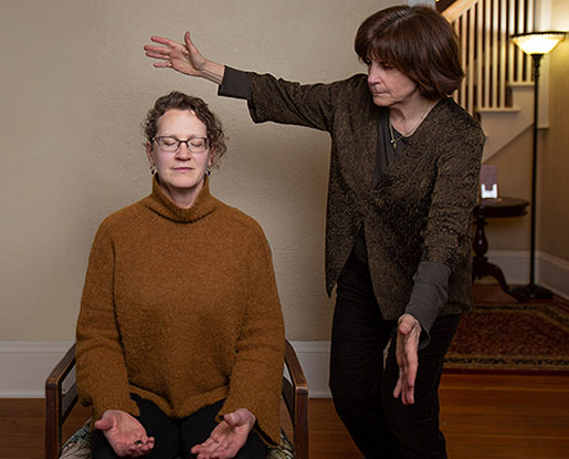 Madeline Hartman spiritual healing with client